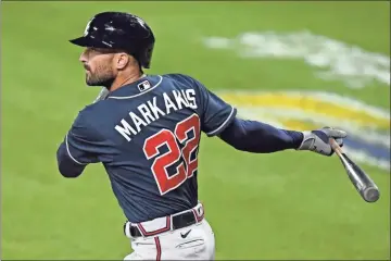  ?? AP - Terrance Williams, file ?? Nick Markakis watches his double during the second inning of the a game against the Orioles last season in Baltimore. The 37-year-old Markakis announced his retirement Friday, ending a 15-year major league career