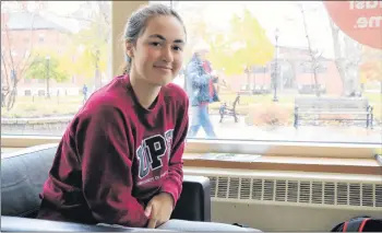  ?? STU NEATBY/THE GUARDIAN ?? Sarah Cheverie, a first-year pre-vet studies student at UPEI, plans to cast her first ballot in the municipal election on Monday. She said candidates could better reach young people by using social media tools like Instagram.