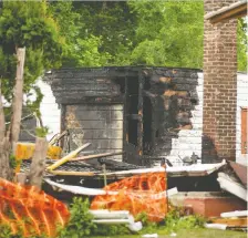  ?? MATT SMITH ?? Little remains of a home that exploded on the 2200 block of Clarence Avenue South just before 4 a.m. on Saturday, leaving at least one person dead.