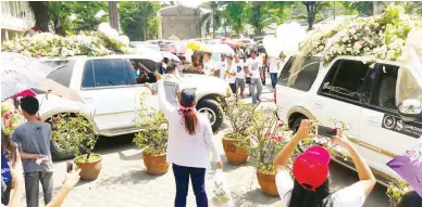  ??  ?? PLARIDEL MOURNS – The caskets of Luisa A. Santos, 78, Rizza Santos-Dela Rosa, 48, John Noel, 17; Noel Timothy, 10 and Crizza Nhoelle, 7 – victims of the plane that crashed into their house – are brought out of the St. Joseph Parish Church in Plaridel,...