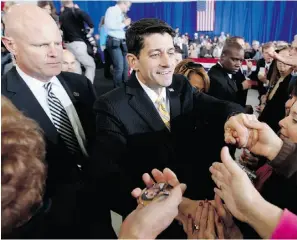  ?? Mary Altaffer/ the associated press ?? Republican vice-presidenti­al candidate Rep. Paul Ryan greets supporters at a