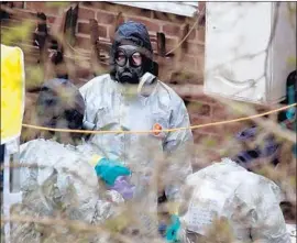  ?? Will Oliver EPA/Shuttersto­ck ?? A TEAM believed to be from the Organizati­on for the Prohibitio­n of Chemical Weapons inspects the home of a poisoned ex-spy in Salisbury, England, in March.