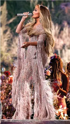  ?? Getty Images ?? The hitmaker took to the stage in a Zuhair Murad jumpsuit.