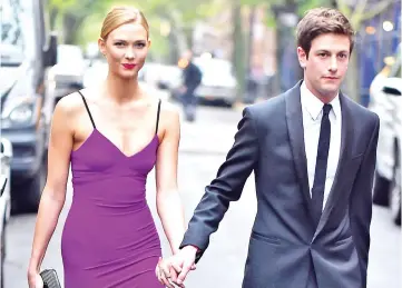  ??  ?? Karlie Kloss (left) will officially be joining the Kushner family.