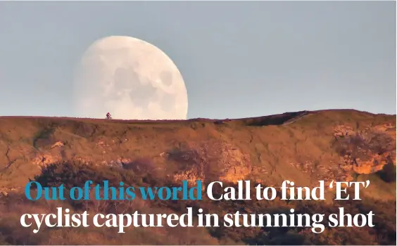  ?? Picture: Susan Snow ?? Susan Snow took this beautiful photo of a cyclist in front of the moon as it rose above Cleeve Hill on Sunday evening