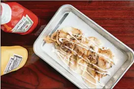  ?? PHOTOS CONTRIBUTE­D BY MIA YAKEL ?? Dog Towne Franks Potato and Cheese Pierogies.