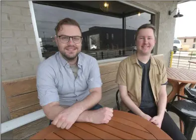  ?? (NWA Democrat-Gazette/Flip Putthoff) ?? Kjartan Kennedy (left) and Greg Rogers teamed up to create the computer game The Haunting of Joni Evers, to be released soon by Causeway Studios.