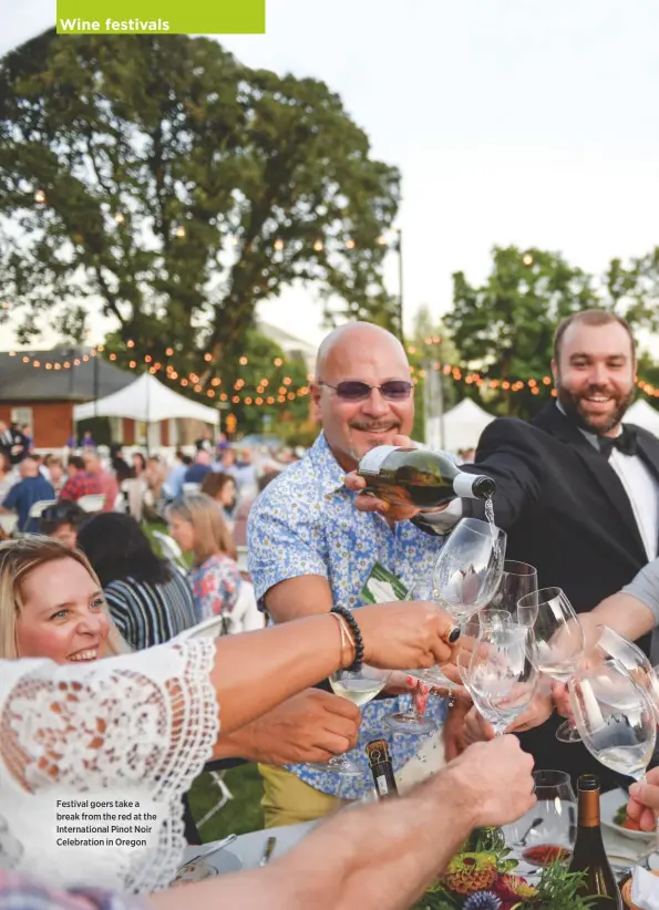  ??  ?? Festival goers take a break from the red at the Internatio­nal Pinot Noir Celebratio­n in Oregon