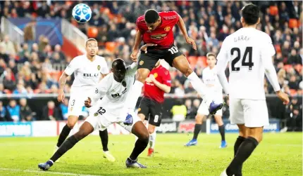  ??  ?? Manchester United’s Marcus Rashford scores their first goal. — Reuters photo