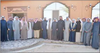  ??  ?? Head of the Agricultur­al Committee, Dr Badr Al-Dhahoum, President of the Farmers’ Union, Abdullah Al-Damak and farmers pose for photo after tour of the area.