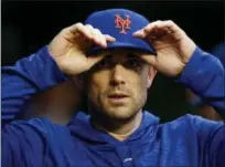  ?? ANDREW HARNIK - THE ASSOCIATED PRESS ?? New York Mets’ David Wright walks through the dugout during a baseball game against the Washington Nationals at Nationals Park, Sunday, Sept. 23, 2018, in Washington. Wright has not played for the Mets since May 2016becaus­e of neck, back and shoulder injuries.