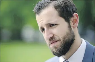  ?? SEAN KILPATRICK, THE CANADIAN PRESS ?? Journalist Ben Makuch of Vice Media arrives at the Supreme Court of Canada in Ottawa on May 23. The Supreme Court says the reporter must give the RCMP material he gathered for stories about an accused terrorist.