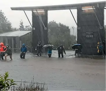  ?? EMERGENCY MANAGEMENT SOUTHLAND ?? Flooding at the Milford Sound Visitor Terminal yesterday. More than 380 people were trapped at Milford Sound because of the weather.