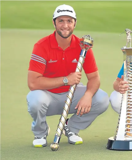  ??  ?? WINNING FEELING: Jon Rahm and Tommy Fleetwood are all smiles as they show off their trophies but it’s agony for Justin Rose as his putt slides past the hole on the 18th green in a thrilling Dubai finale