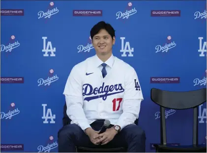  ?? ASHLEY LANDIS — THE ASSOCIATED PRESS ?? Los Angeles Dodgers’ Shohei Ohtani answers questions during a baseball news conference at Dodger Stadium last Thursday in Los Angeles.