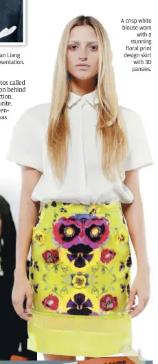  ??  ?? Paris-based Malaysian designer Jonathan Liang at his Spring/Summer 2013 fashion presentati­on. a crisp white blouse worn
with a stunning floral print design skirt with 3d pansies.