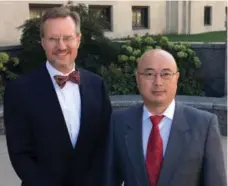  ?? DEL QUENTIN WILBER/LOS ANGELES TIMES/TRIBUNE NEWS SERVICE ?? Mo Hailong, right, and his attorney, Mark Weinhardt, after the Florida resident was sentenced to three years in prison for stealing trade secrets.