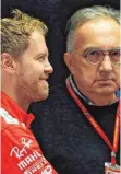  ?? FOTO: DPA ?? Sie hoffen noch: Sebastian Vettel (li.), Sergio Marchionne.