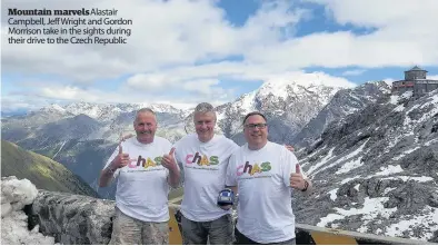  ??  ?? Mountain marvelsala­stair Campbell, Jeff Wright and Gordon Morrison take in the sights during their drive to the Czech Republic