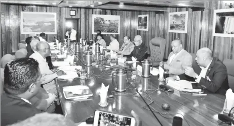  ??  ?? President David Granger (third, from right) leading a government delegation in a consultati­on with the Guyana Elections Commission (GECOM) members and the GECOM Secretaria­t staff at the Ministry of the Presidency. (Ministry of the Presidency photo)