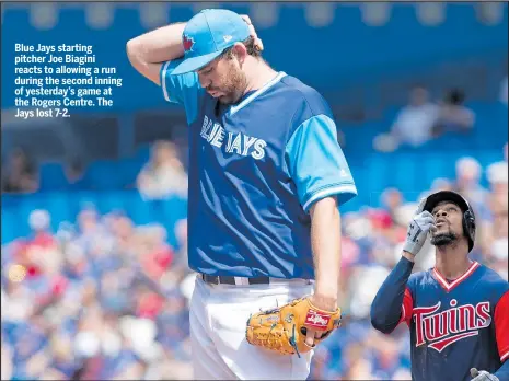  ??  ?? Blue Jays starting pitcher Joe Biagini reacts to allowing a run during the second inning of yesterday’s game at the Rogers Centre. The Jays lost 7-2. CHRIS YOUNG/THE CANADIAN PRESS PHOTOS