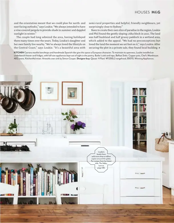  ??  ?? KITCHEN Carrara marble benchtops and handmade Spanish tiles give this space a European character. To maintain its openness, Loukie installed an underbench freezer and fridges, with full-size appliances kept out of sight in the pantry. Butler’s sink and...