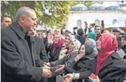  ?? AP ?? Turkey’s President Recep Tayyip Erdogan (L) speaks to supporters outside the Eyup Sultan Mosque in Istanbul on Monday.