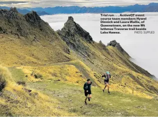  ?? PHOTO: SUPPLIED ?? Trial run . . . ActiveQT event course team members Hywel Dinnick and Laura Wallis, of Queenstown, on the new Mt Isthmus Traverse trail beside Lake Hawea.