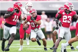  ?? (AP Photo/john Bazemore) ?? Georgia’s Mekhi Mews (87) returns a Ball State punt for touchdown Saturday in the first half of an NCAA college football game in Athens, Ga.