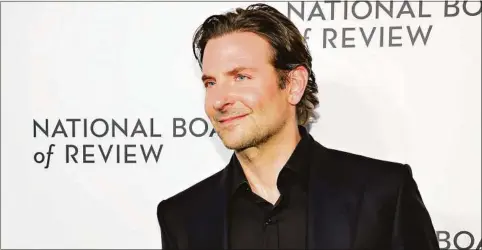  ?? Cindy Ord / WireImage ?? Above, Bradley Cooper attends the National Board of Review annual awards gala at Cipriani 42nd
Street on March 15 in New York City.