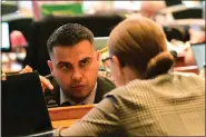  ?? HYOUNG CHANG — DENVER POST FILE ?? Then-state Rep. Dave Williams, left, talks with Rep. Stephanie Luck in the Colorado House Chamber in 2022. Williams, the Republican Party chairman, is running for the 5th Congressio­nal District seat.