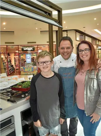  ?? Photo: Bev Lacey ?? KEEN COOKS: Chef Alastair McLeod (centre) passes on a few tips to Kevin O’Donohoe (left) and Michelle Casius-Smith at Grand Central.