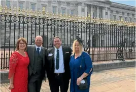  ??  ?? Donna McKenzie, Coastguard Riverton president Ross Mackenzie, Coastguard Rotorua Lakes president Barry Grouby and Sharon Grouby outside Buckingham Palace in London.