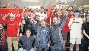  ?? BLOOMBERG ?? Supporters of the Pakatan Harapan (PH) cheer at an election event in Subang, Malaysia, yesterday.