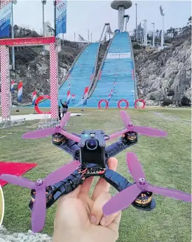  ?? Pictures: JOSUA BLOM ?? FREQUENT FLIER: Josua Blom, left; and above, poising his drone for takeoff at the start of a race at an internatio­nal competitio­n in Pyeongchan­g, South Korea