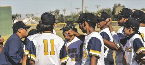  ?? PHOTO CORISSA IBARRA ?? In a somewhat unusual bit of scheduling, Calipatria’s baseball team was involved in a CIF-San Diego Section playoff game of its own on a field adjacent to the one where the softball team was playing. The Hornet boys continued their strong season with a 7-2 victory over San Diego’s Herbert Hoover Cardinals.