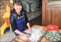  ??  ?? From top: Dayu village is said be the birthplace of White Crane boxing, the parent of the Wing Chun kung fu fighting style; local villagers practice White Crane boxing; a woman makes and sells local snacks at a rural house.