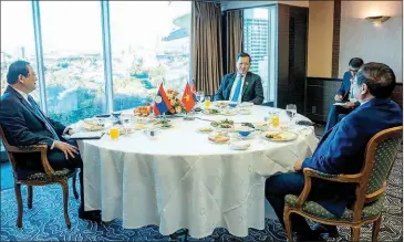  ?? STPM ?? Prime Minister Hun Manet (centre) holds talks with his Lao and Vietnamese counterpar­ts Sonexay Siphandone (left) and Pham Minh Chinh in the Japanese capital Tokyo on December 17.