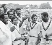  ?? GETTY IMAGES ?? The West Indies cricket team with the World Cup trophy in 1979.