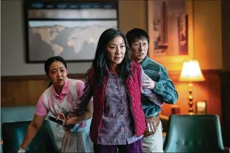  ?? RIGGS/A24/TNS ALLYSON ?? From left, Stephanie Hsu, Michelle Yeoh and Ke Huy Quan in “Everything Everywhere All At Once.”