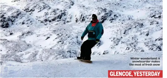  ??  ?? Winter wonderland: A snowboarde­r makes the most of fresh snow GLENCOE, YESTERDAY