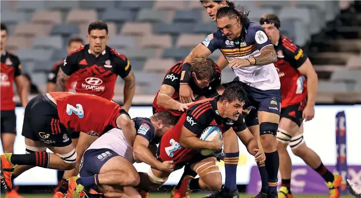  ?? Photo: Rugby News ?? Crusaders blindside flanker Pablo Matera (with ball) makes one of his strong carries against the Brumbies at the GIO Stadium in Canberra, Australia, on May 14, 2022.