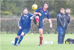  ??  ?? Ball watching between Monifieth Hurricanes (dark blue/red) and St James.