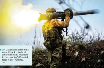  ?? ?? An Ukrainian soldier fires an anti-tank missile at an undisclose­d location in the country’s Donetsk region, on Thursday.