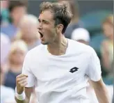  ?? Kirsty Wiggleswor­th/Associated Press ?? Russia’s Daniil Medvedev upset No. 5-seeded Stan Wawrinka Monday on Day 1 of the Wimbledon Championsh­ips in London.