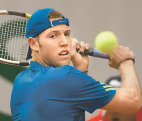  ?? SUSAN MULLANE, USA TODAY SPORTS Jack Sock, above, beat Guillermo Garcia-lopez in straight sets Tuesday and will face 12th-seeded Tommy Haas in the second round. ??
