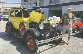  ?? ALYN EDWARDS PHOTOS ?? Dave Jones shows off the re-restored 1928 Ford Model A sedan he purchased for his father, now ready for the Peking to Paris endurance rally.