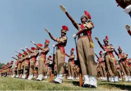  ?? — PTI ?? Newly-recruited jail warders take oath during a convocatio­n parade at Motilal Nehru Stadium in Bhopal on Wednesday.