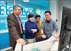  ?? Contribute­d photo / UConn ?? University of Connecticu­t President Thomas C. Katsouleas in the new Synchrony Digital Technology Center at UConn Stamford