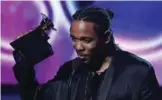  ?? — AFP ?? In this file photo Kendrick Lamar receives the Grammy for the Best Rap Album for ‘DAMN’ during the 60th Annual Grammy Awards show in New York.